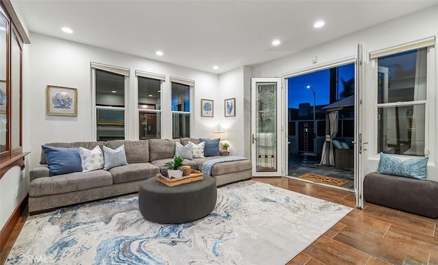 living room featuring wood finish floors and recessed lighting