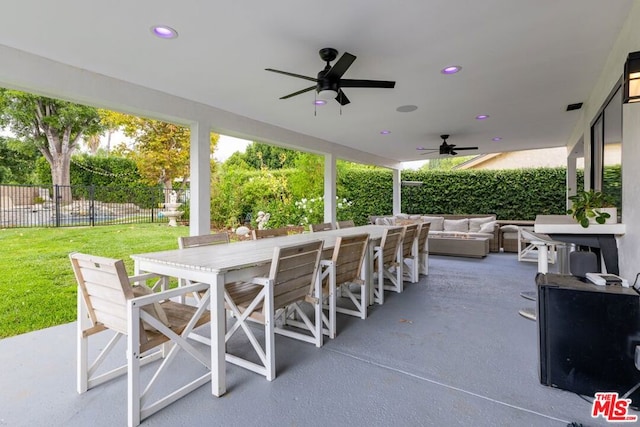 view of patio / terrace with ceiling fan and an outdoor hangout area