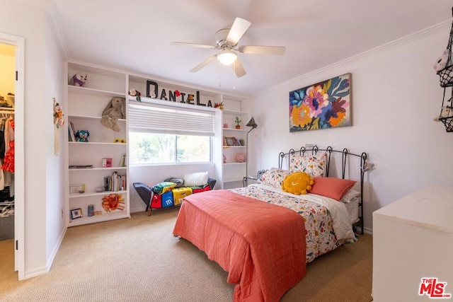 carpeted bedroom with crown molding and ceiling fan