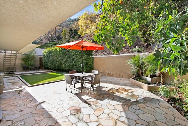 view of patio with outdoor dining space