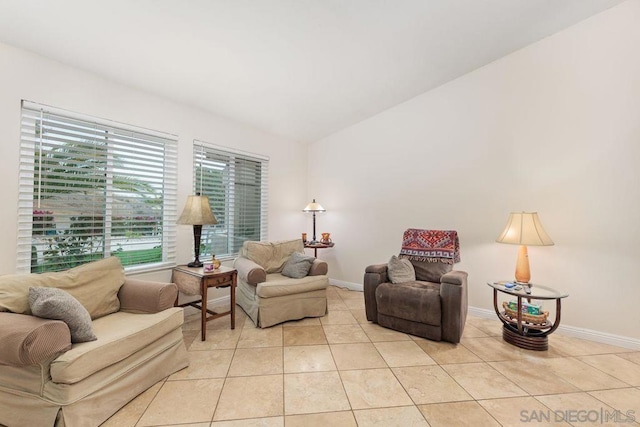 sitting room with light tile patterned floors