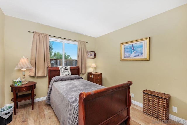 bedroom with light hardwood / wood-style flooring