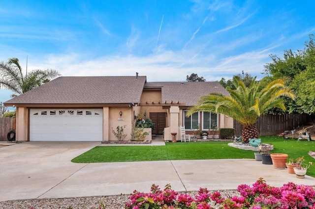 ranch-style home featuring a garage and a front lawn