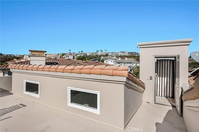 view of side of property with a patio area