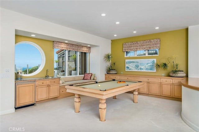 recreation room with sink and billiards