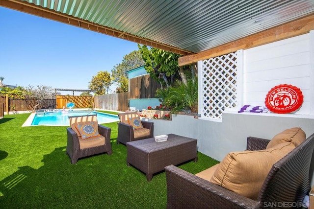 view of patio / terrace with outdoor lounge area and a fenced in pool