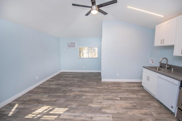 kitchen featuring white dishwasher, dark hardwood / wood-style flooring, sink, and white cabinets