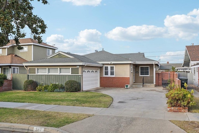 view of front facade with a garage and a front lawn