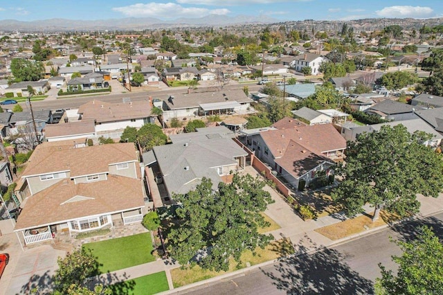 birds eye view of property featuring a mountain view