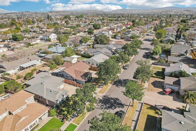 birds eye view of property featuring a mountain view