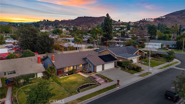 aerial view at dusk with a mountain view