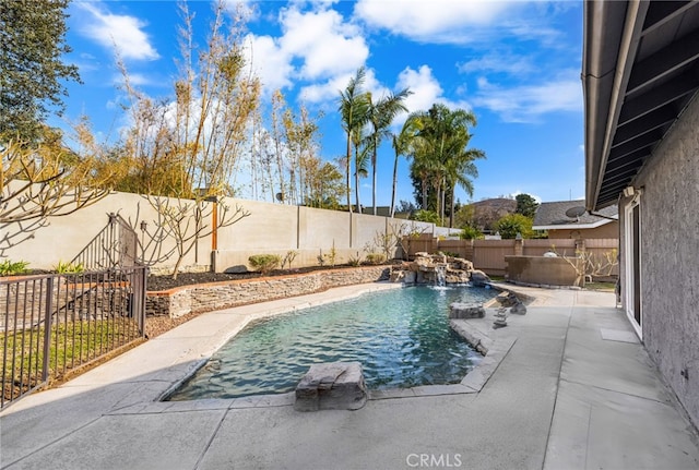 view of pool featuring a patio and pool water feature