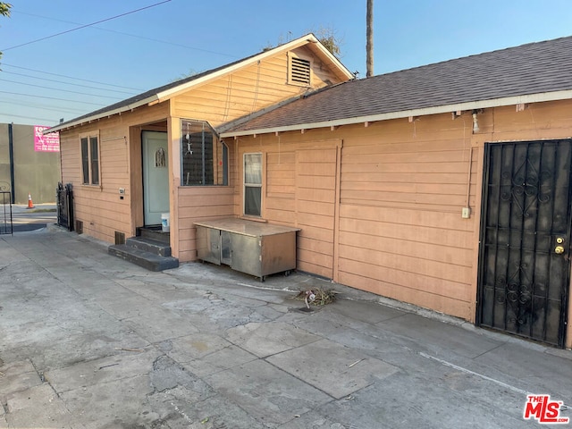 back of house featuring a patio