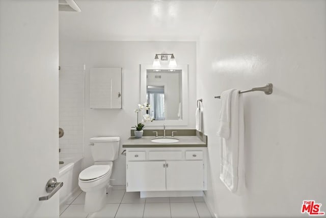 full bathroom with tile patterned floors, toilet, shower / bathing tub combination, and vanity