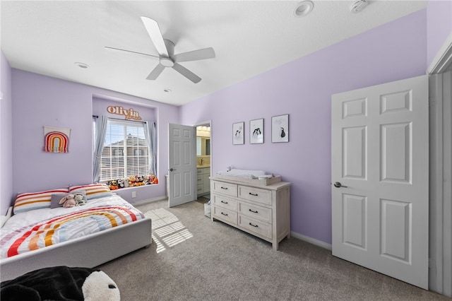 carpeted bedroom with ceiling fan