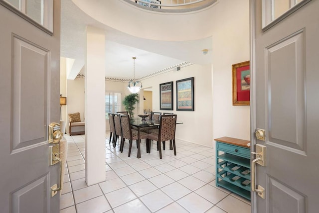 foyer entrance featuring light tile patterned floors