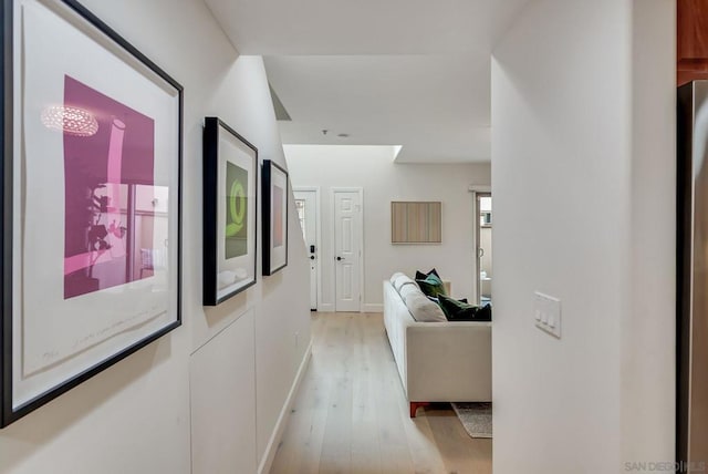 hallway featuring light hardwood / wood-style flooring