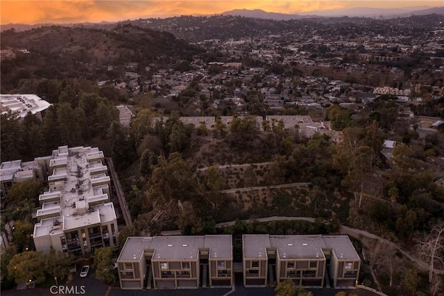 aerial view at dusk with a mountain view