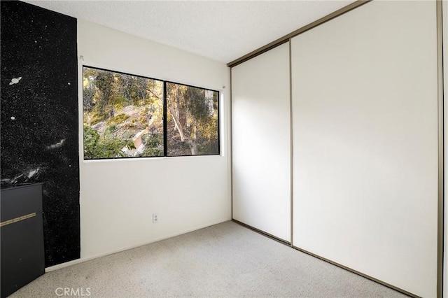 unfurnished bedroom featuring a closet