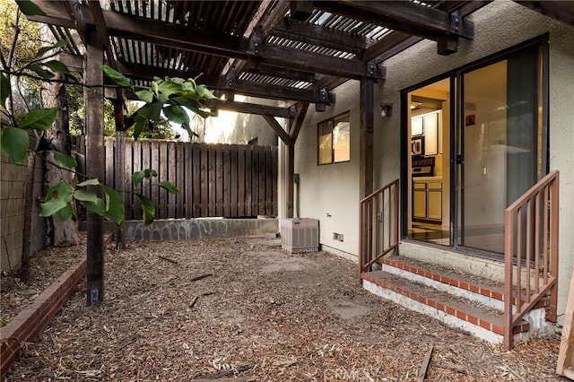 view of patio / terrace with a fenced backyard, central AC, a pergola, and entry steps