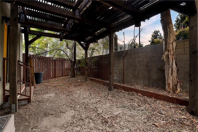 yard at dusk with a pergola