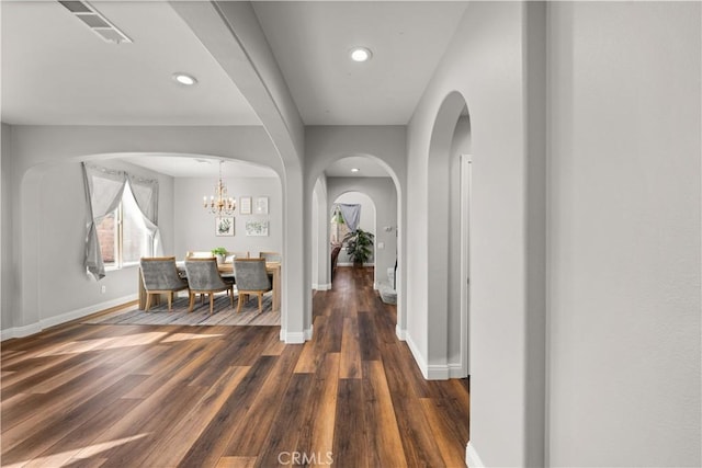 hall featuring dark wood-type flooring