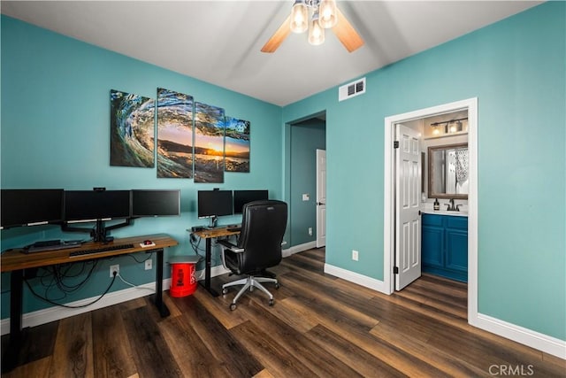 office featuring ceiling fan, dark hardwood / wood-style flooring, and sink