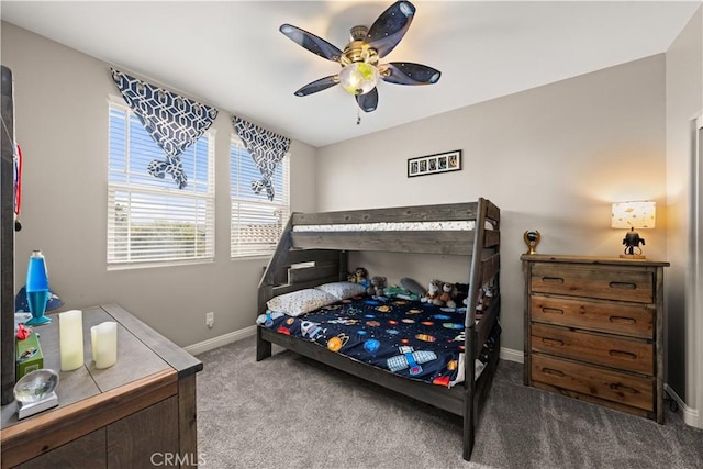 bedroom with ceiling fan and light colored carpet