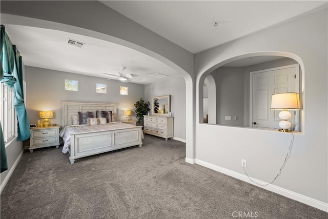 bedroom featuring dark colored carpet and ceiling fan