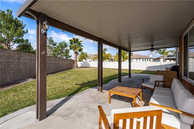 view of patio / terrace with ceiling fan and an outdoor hangout area