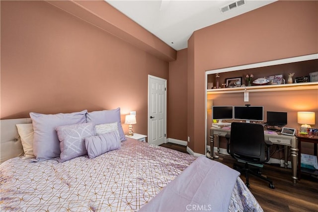 bedroom with hardwood / wood-style floors