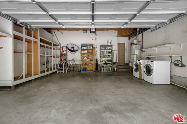 garage with washing machine and dryer