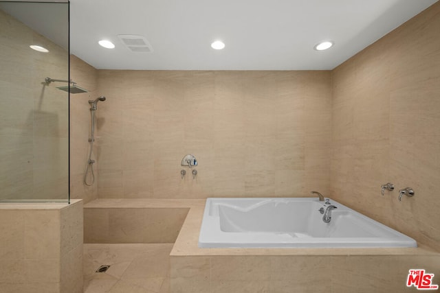 bathroom with independent shower and bath