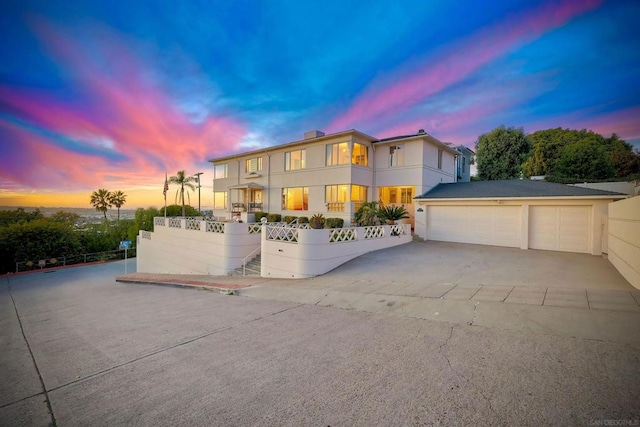 view of front of property featuring a garage