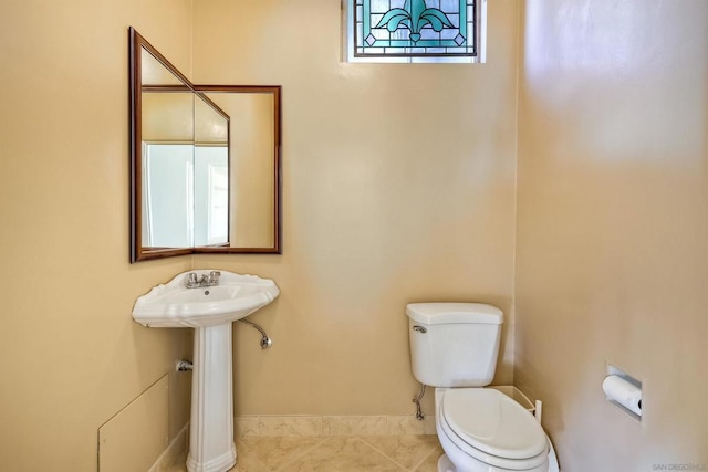 bathroom featuring toilet