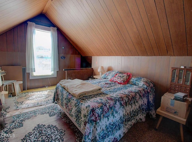 bedroom with lofted ceiling, wooden walls, carpet, and wooden ceiling