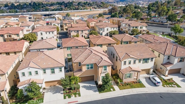 birds eye view of property with a residential view