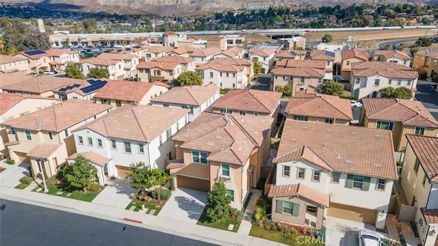 bird's eye view featuring a residential view and a mountain view