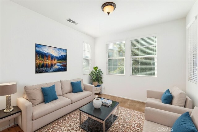 living room featuring light colored carpet