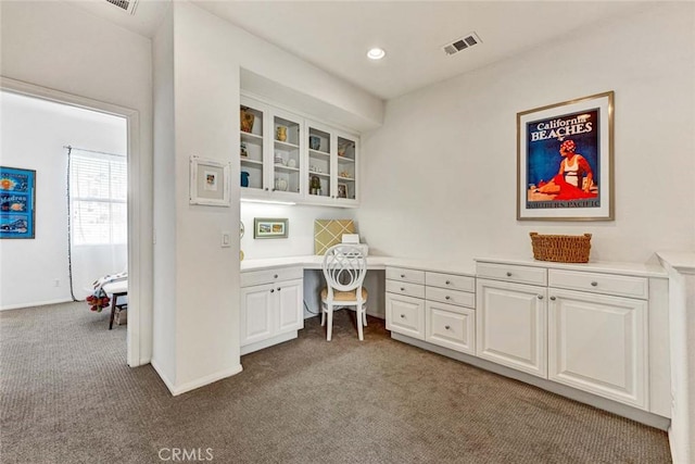 office space featuring carpet and built in desk