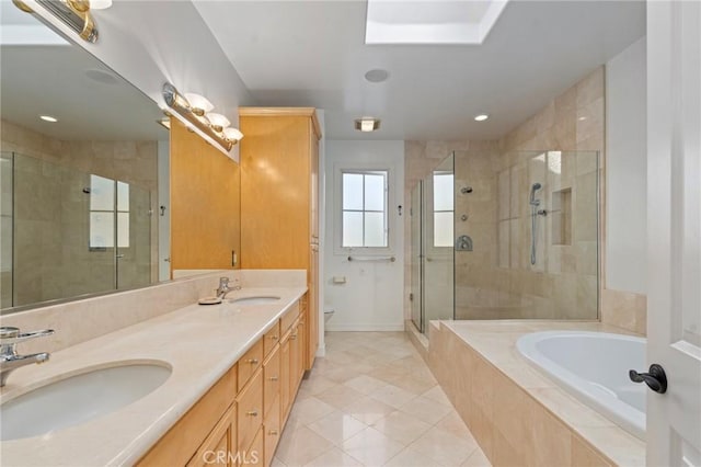 full bathroom with shower with separate bathtub, vanity, tile patterned floors, and toilet