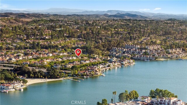 bird's eye view with a water and mountain view