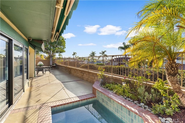 view of pool with a patio