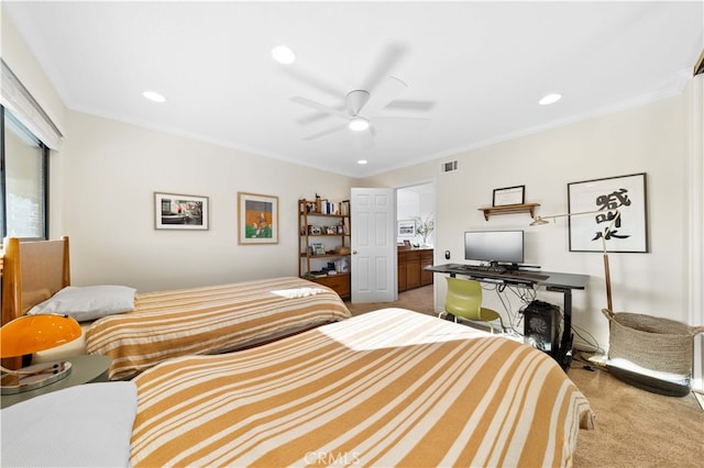 bedroom featuring crown molding, ceiling fan, and carpet