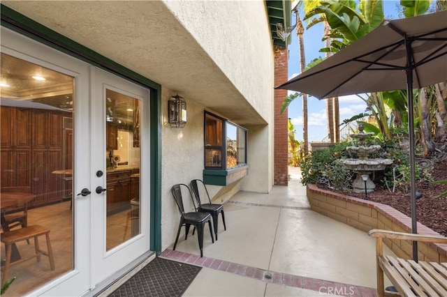 view of patio featuring french doors