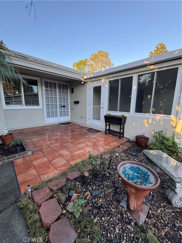 rear view of house with a patio