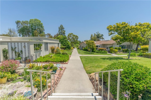 394 Avenida Castilla Unit F, Laguna Woods, CA 92637 - view of community with a yard