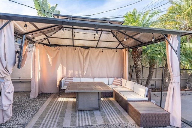 view of patio / terrace featuring a gazebo and an outdoor living space