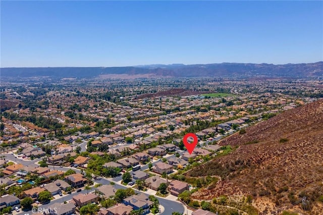 drone / aerial view featuring a mountain view