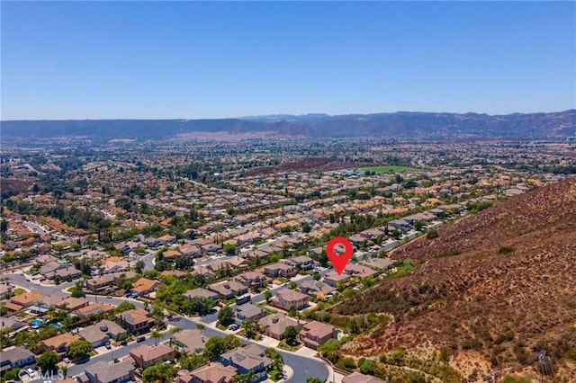 aerial view with a mountain view and a residential view